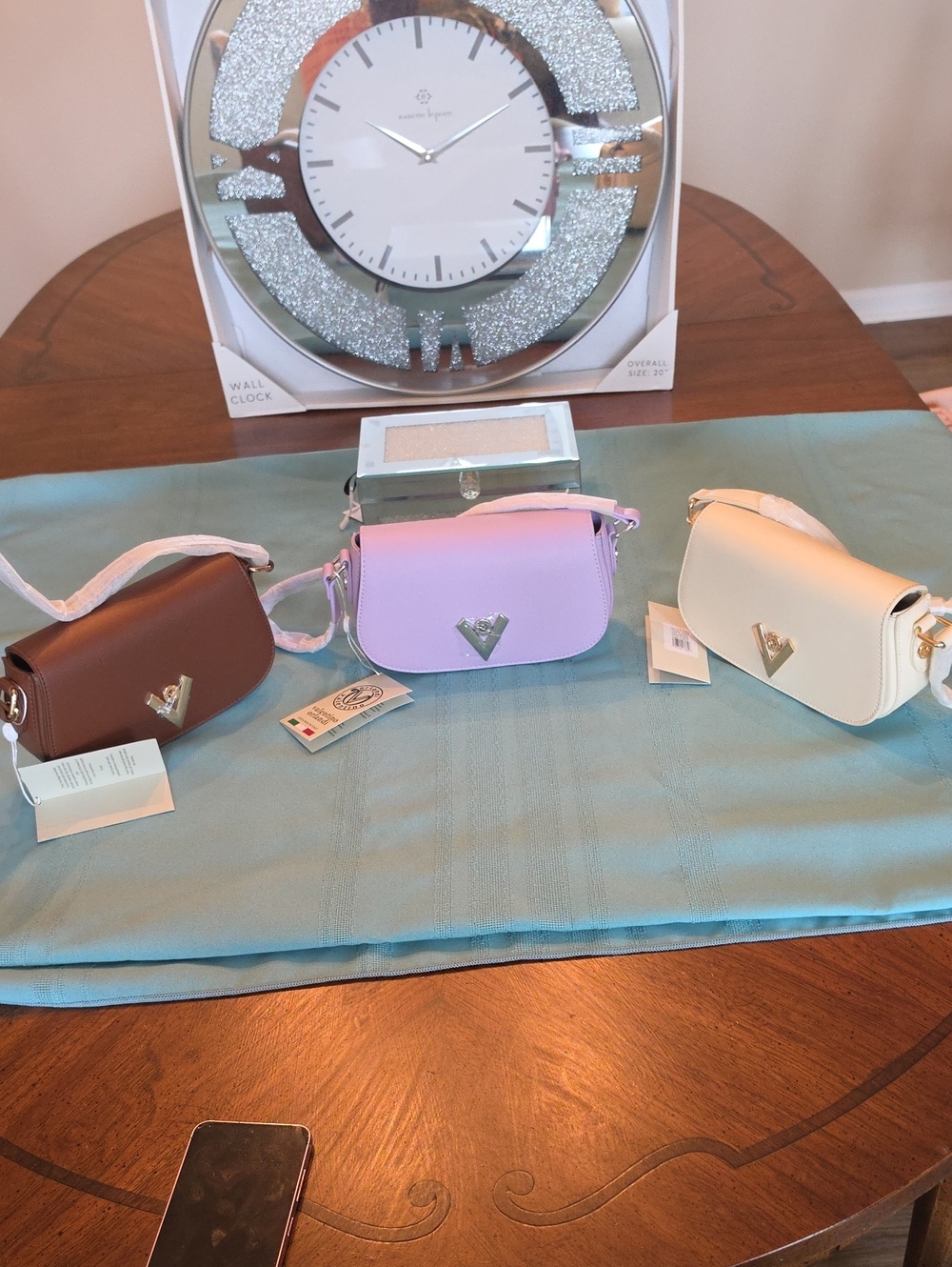 Triangular Logo Crossbody Bag in Purple, Brown, and Cream